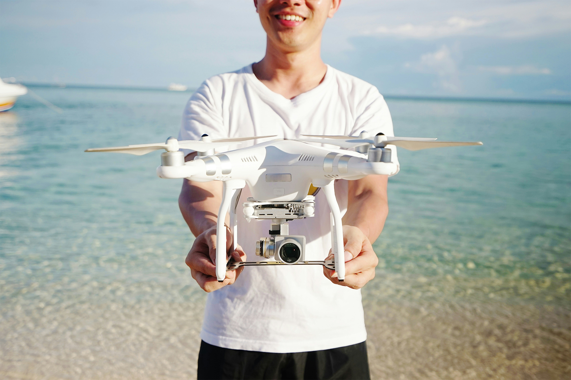 Smiling Boy Holding Drone